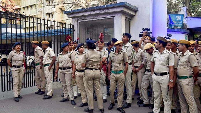 Security personnel stand guard outside Bhavani Bhawan (West Bengal Police headquarters) where CBI officials arrived to take Trinamool Congress leader Sheikh Shahjahan, accused in the Sandeshkhali case, in Kolkata, Wednesday, March 6, 2024 | PTI