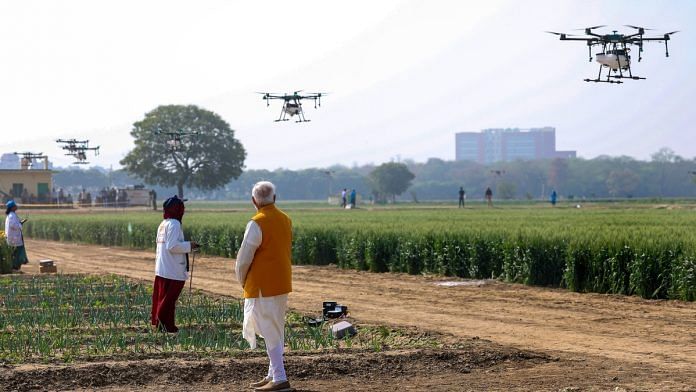 Prime Minister Narendra Modi witnesses agricutural drone demonstration by 'Namo Drone Didis' at the Indian Agricultural Reseach Institute, in New Delhi, Monday, March 11, 2024 | PTI
