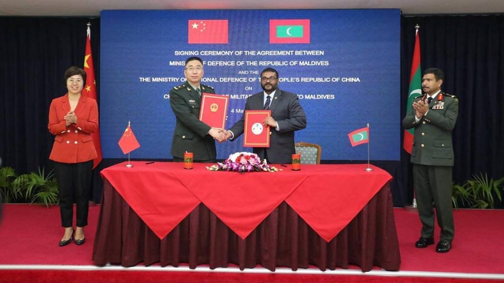 Maldivian Defence Minister Mohamed Ghassan Maumoon and China's Major General Zhang Baoqun after signing the military assistance agreement on 4 March | X/MoDmv