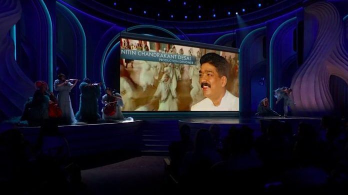 Indian Art Director Nitin Chandrakant Desai remembered in tribute at the 96th Academy Awards | X (formerly Twitter) /@idigutipnis