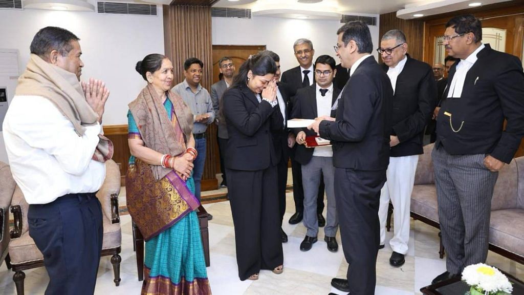 Pragya Samal and her parents with CJI DY Chandrachud while receiving signed books from him | Supreme Court of India