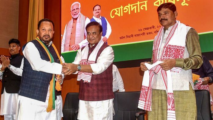 Assam Chief Minister Himanta Biswa Sarma felicitates former Assam Pradesh Congress Committee (APCC) Working President Rana Goswami after the former joined BJP at the state party headquarters, in Guwahati, Thursday, Feb. 29, 2024. Assam BJP President Bhabesh Kalita is also seen | PTI