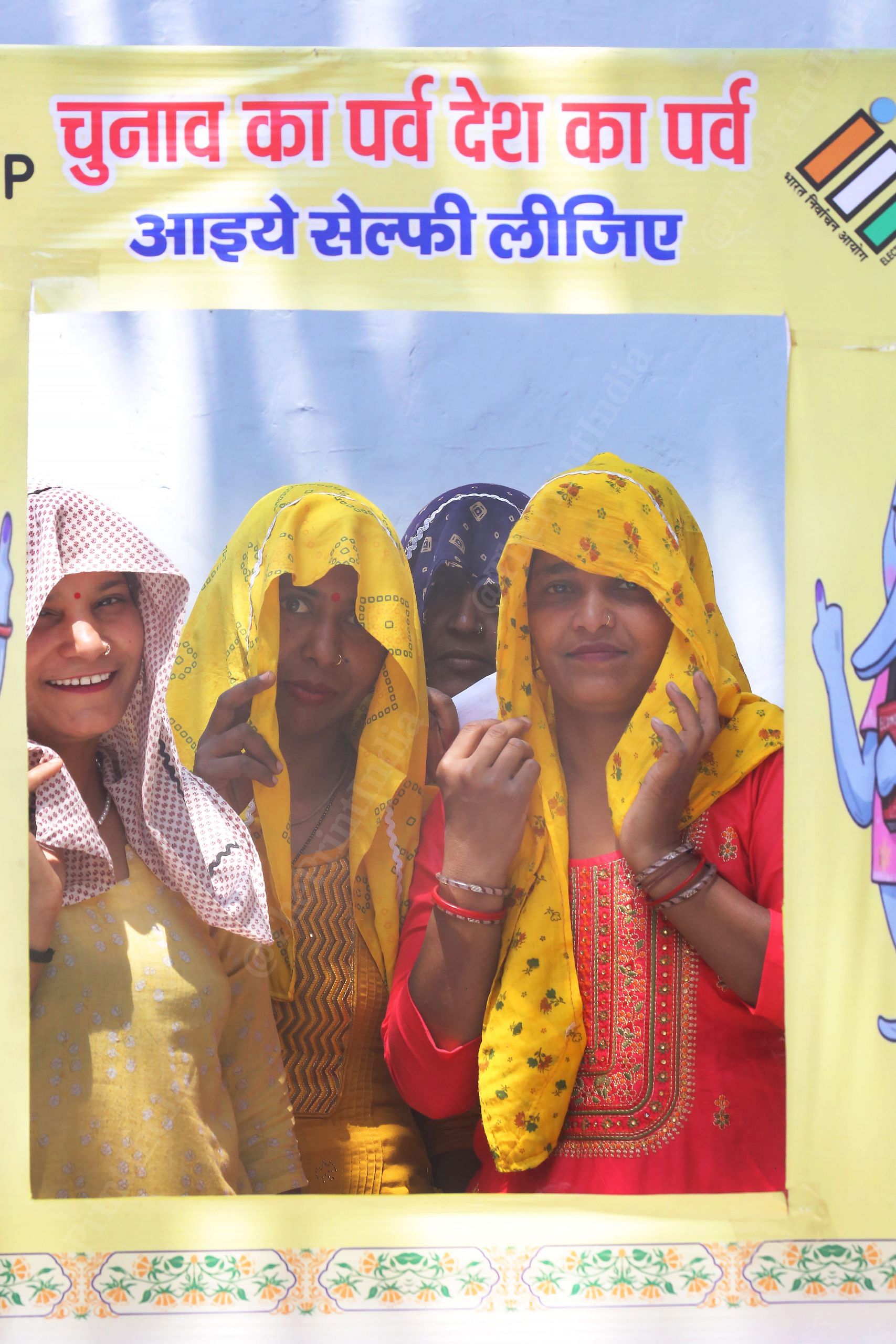 Women at a photo booth at a polling station in UP | Praveen Jain | ThePrint
