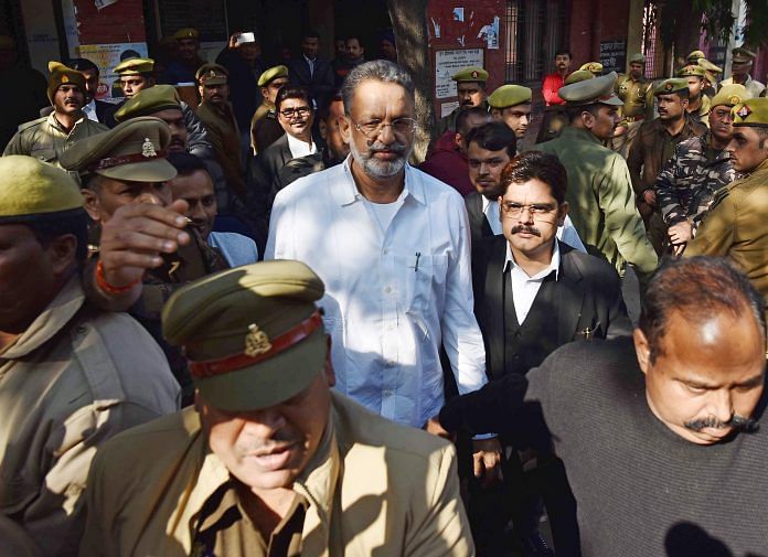 File photo of gangster-turned-politician Mukhtar Ansari outside district court in Prayagraj | ANI