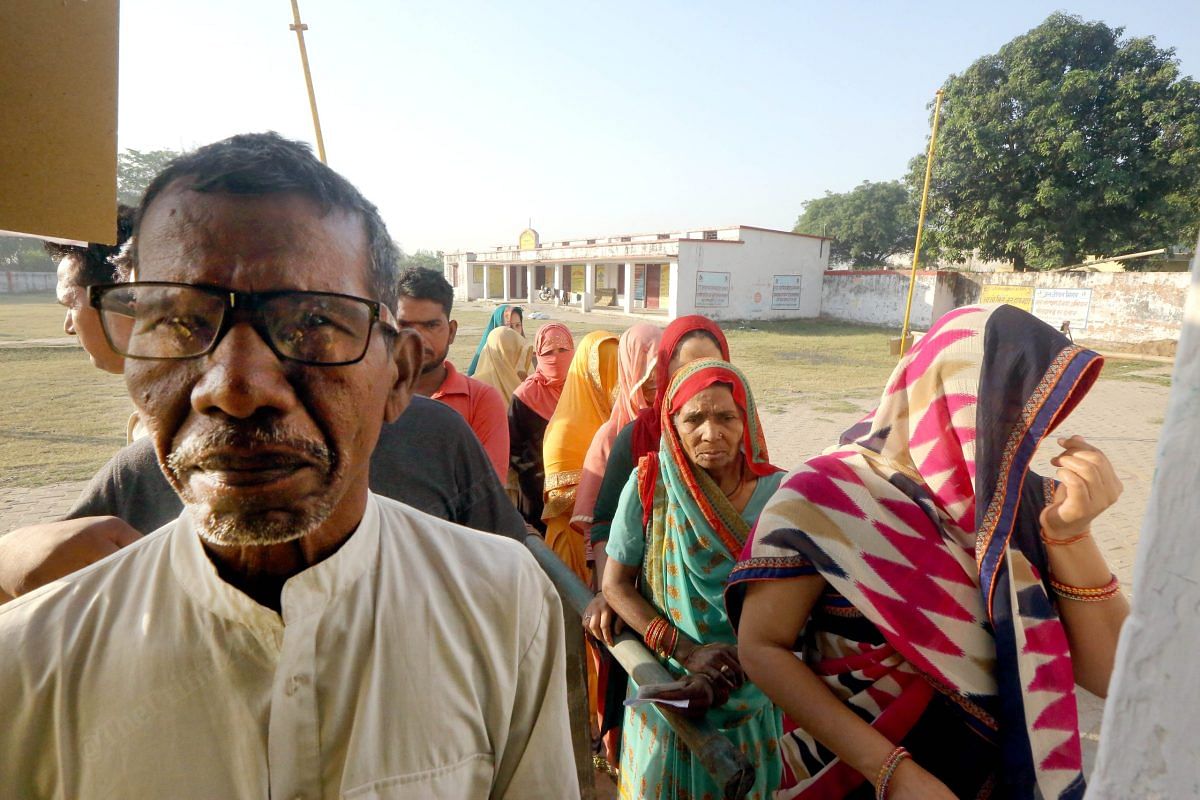 Women and men wait in queue to vote | Praveen Jain | ThePrint