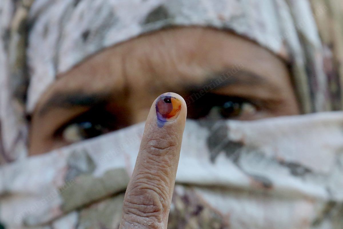 A woman after casting her vote at Muslim Girls Inter College, Amroha | Praveen Jain | ThePrint