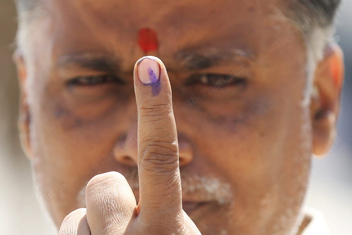 A man showing indelible ink on his finger | Praveen Jain | ThePrint