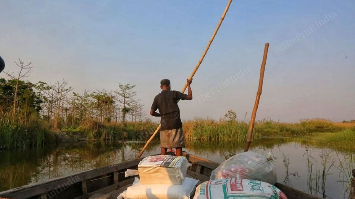 A boat crosses the Girwa river with supplies | Praveen Jain | ThePrint