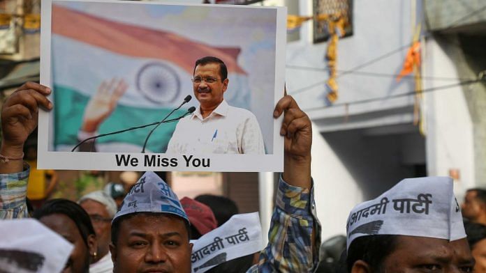 AAP supporters during roadshow in Delhi, Saturday | Suraj Singh Bisht | ThePrint
