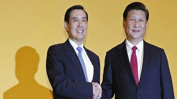 Xi hosts former Taiwanese president in Beijing, says nobody can stop 'family reunion'