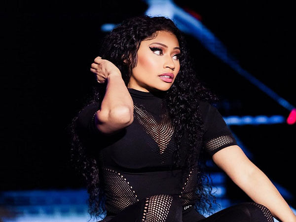 Nicki Minaj gets hit by object on stage, throws it back into crowd  