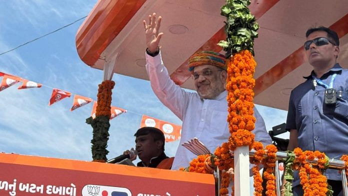 Amit Shah during roadshow in Sanand on 18 April, 2024 | Janki Dave | ThePrint
