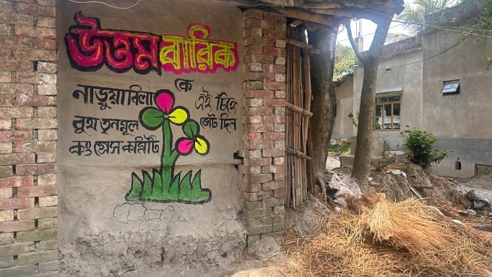 Election graffiti on outer wall of arrested TMC worker's house in Bhupatinagar | Sreyashi Dey | ThePrint
