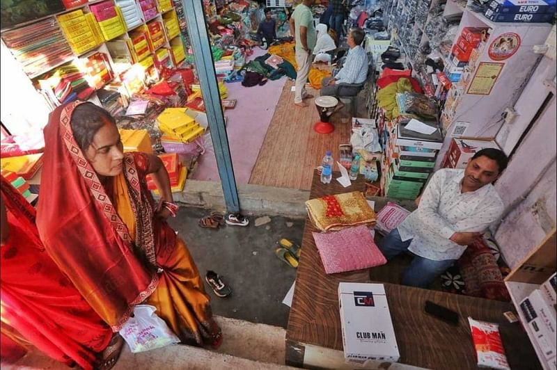 Mall gram panchayat pradhan Ashutosh Chaurasia at his saree shop in Mall village | Praveen Jain | ThePrint