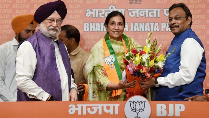 Union Minister for Housing and Urban Affairs Hardeep Singh Puri and BJP National General Secretary Vinod Tawde welcome former IAS officer Parampal Kaur as she joins the BJP at the party headquarters in New Delhi | Photo: ANI/Shrikant Singh