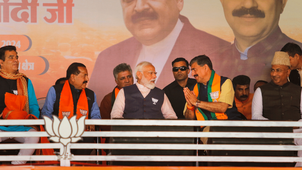 Prime Minister Narendra Modi with Union Minister and BJP candidate Jitendra Singh, BJP J&K President Ravinder Raina and others during a public meeting ahead of Lok Sabha elections, in Udhampur district, Friday, 12 April, 2024 | PTI