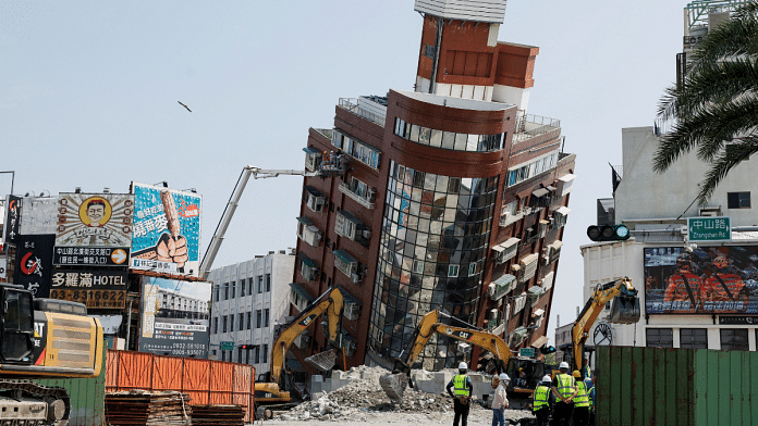 Workers at the site where a building collapsed in Hualien, Taiwan on 4th April | Reuters