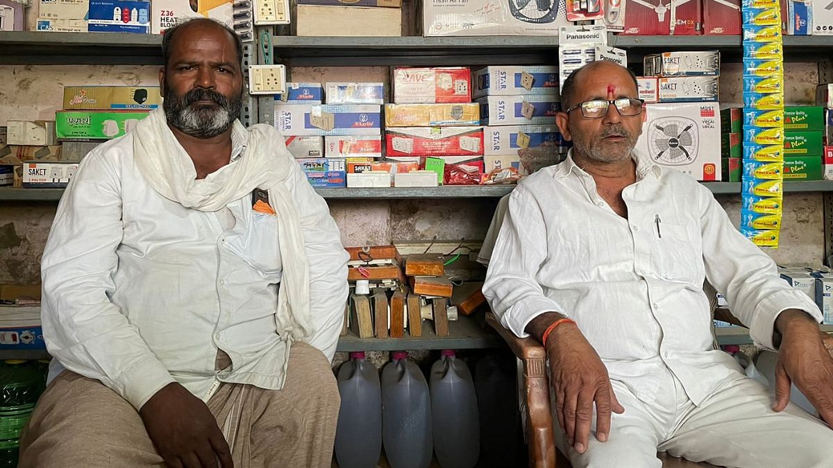Shiv Kumar Yadav, an electrical shop owner (R); Raj Kumar Ram | Sanya Dhingra | ThePrint