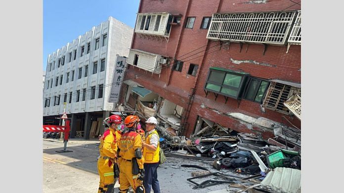 Firefighters work at the site of a collapsed building in Hualien, April 3, 2024. Taiwan National Fire Agency/Handout