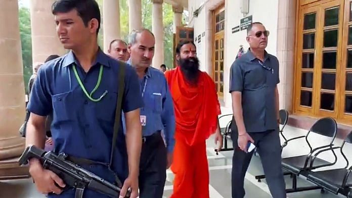 Yog guru and brand ambassador Patanjali Ayurved Baba Ramdev arrives at the Supreme Court to attend the hearing relating to alleged misleading advertisements by Patanjali Ayurved, in New Delhi on Tuesday, 16 April | ANI