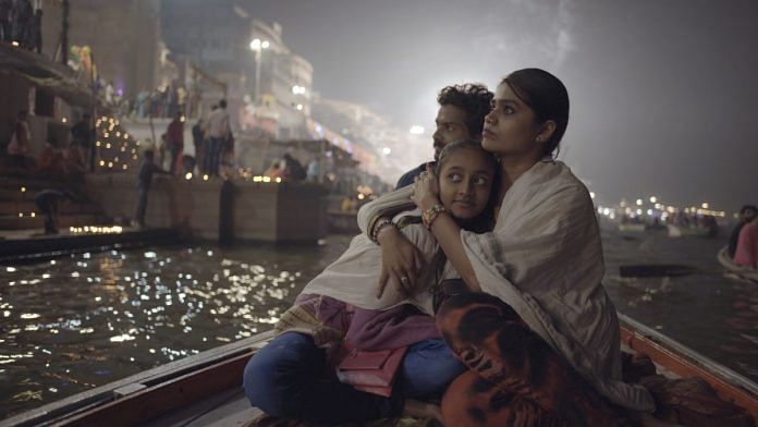 Babu, Rani and Pinky watch the fireworks on a boat in a still from Ritesh Sharma’s Jhini Bini Chadariya | By special arrangement