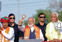 Prime Minister Narendra Modi holds a roadshow for BJP candidate Kanhaiya Lal Meena ahead of the Lok Sabha polls in Dausa, Rajasthan | ANI