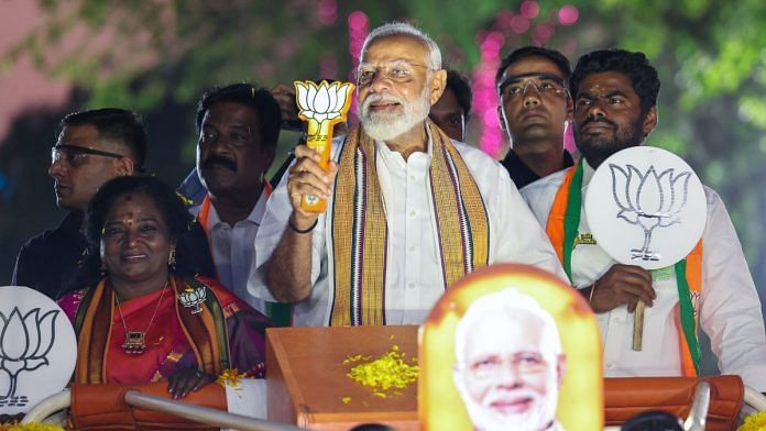Prime Minister Narendra Modi holds a roadshow with Tamil Nadu BJP Chief K Annamalai (right) and the party's South Chennai candidate Tamilisai Soundararajan (left) ahead of Lok Sabha polls. | ANI