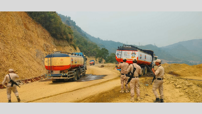 Security personnel at the site where fuel tankers came under attack on Tuesday in Manipur | By Special Arrangement