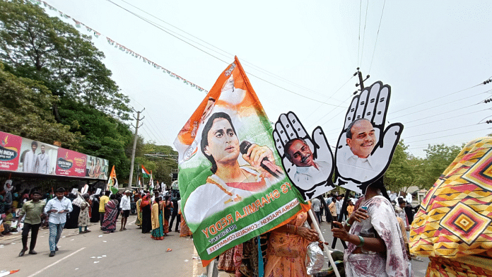 Congress supporters with poll paraphernalia having picture of YS Sharmila, Vivekananda Reddy and YSR Reddy, in Kadapa town | Prasad Nichenametla | ThePrint