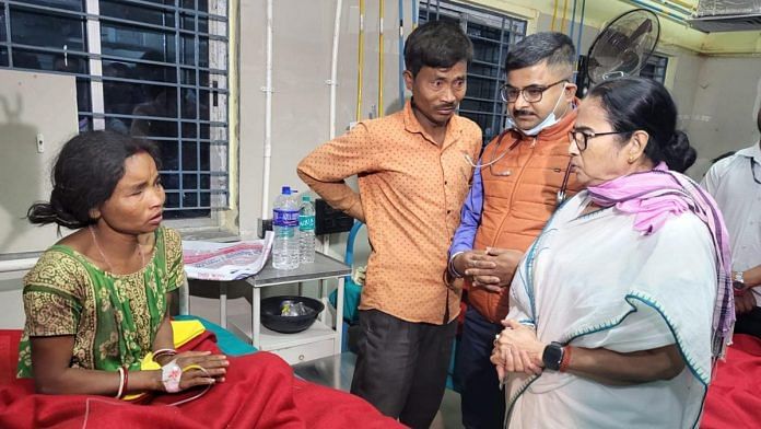 West Bengal Chief Minister and TMC supremo Mamata Banerjee visits people injured in a storm, at a hospital in Jalpaiguri district, Sunday night, March 31, 2024 | PTI