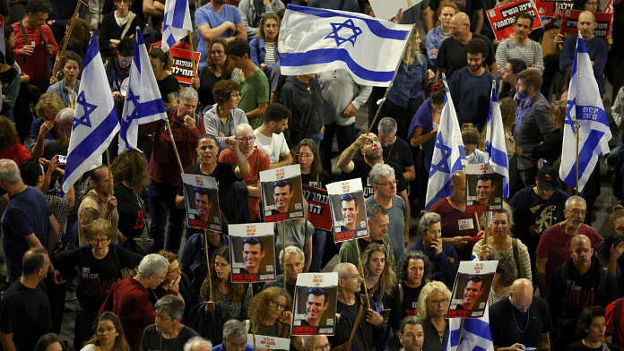 File Photo | People attend a protest against Israeli Prime Minister Benjamin Netanyahu's government and to call for the release of hostages kidnapped in the deadly 7 October attack on Israel by Hamas from Gaza, in Tel Aviv, Israel, 20 April 2024 | Reuters/Hannah McKay
