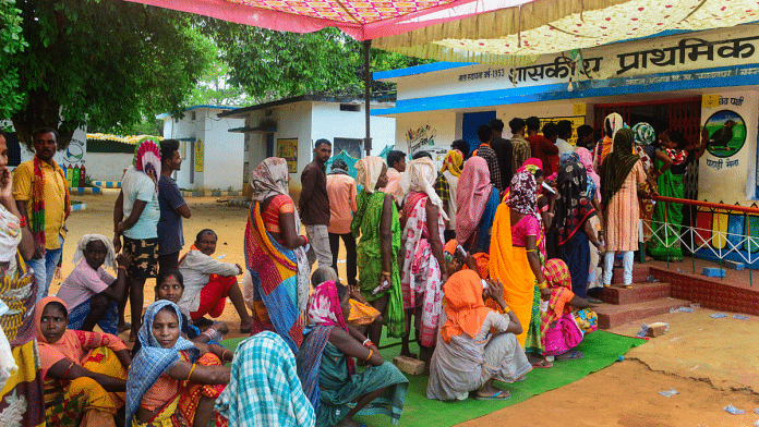 People wait to cast their votes for Lok Sabha elections in Nettapakkam constituency area, 19 April 2024 | PTI