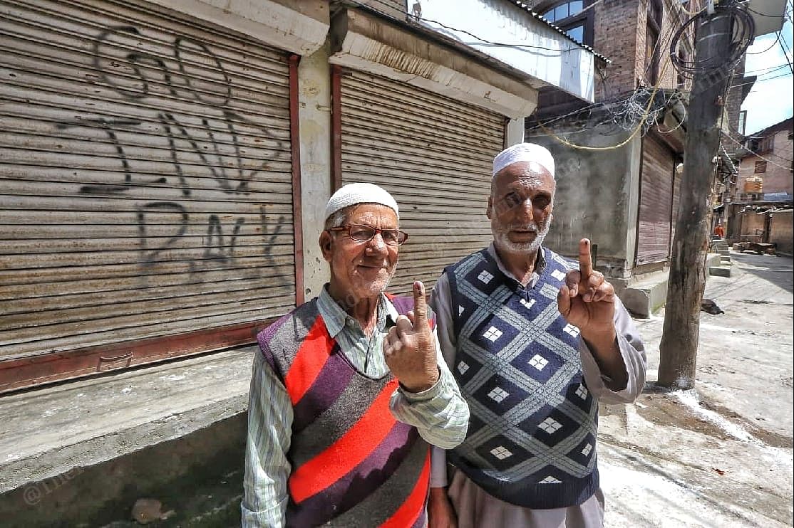 Voters showing inked fingers at downtown Kashmir | Praveen Jain | ThePrint