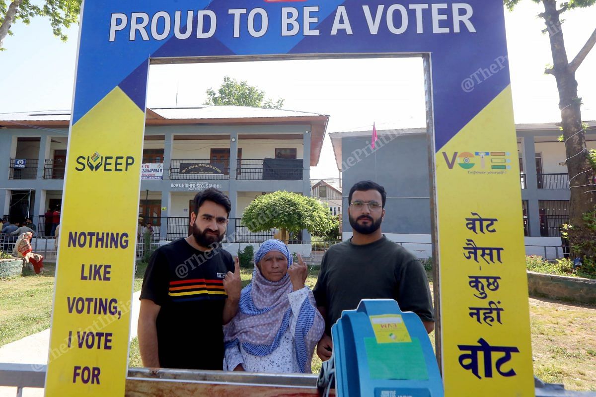 Voters pose for a picture after casting their vote in Zainapora | Praveen Jain | ThePrint