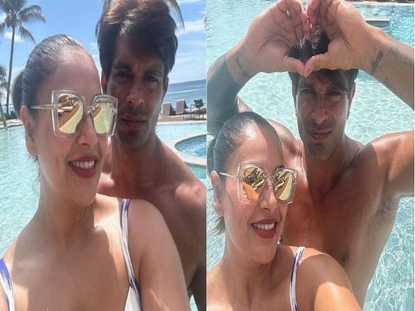  Bipasha Basu shares photos with hubby Karan Singh Grover from their pool time