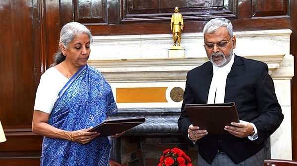 Union minister Nirmala Sitharaman administered oath to GSTAT President Justice (Retd.) Sanjaya Kumar Mishra | ANI