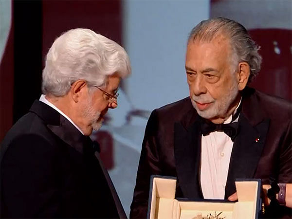 Cannes: Francis Ford Coppola presents 'Star Wars' creator George Lucas with honorary Palme d'Or 