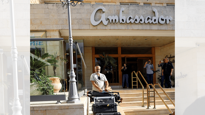 A man manoeuvres media equipment following an Israeli police raid on Al Jazeera's de facto office at the Ambassador Hotel in Jerusalem, 5 May, 2024 | Reuters/Jamal Awad