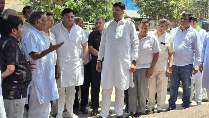 Former Haryana deputy chief minister and JJP leader Dushyant Chautala (centre) is increasingly facing revolt in the party | Pic credit: X/@Dchautala