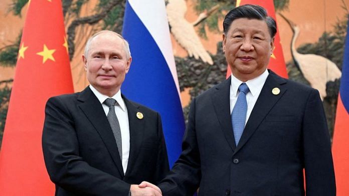 Russian President Vladimir Putin shakes hands with Chinese President Xi Jinping during a meeting at the Belt and Road Forum in Beijing, China, October 18, 2023. Sputnik/Sergei Guneev/Pool via REUTERS /File Photo