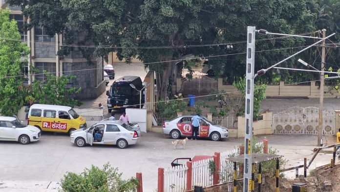 Media outside home of H.D. Revanna in Holenarsipura, Hassan | ThePrint