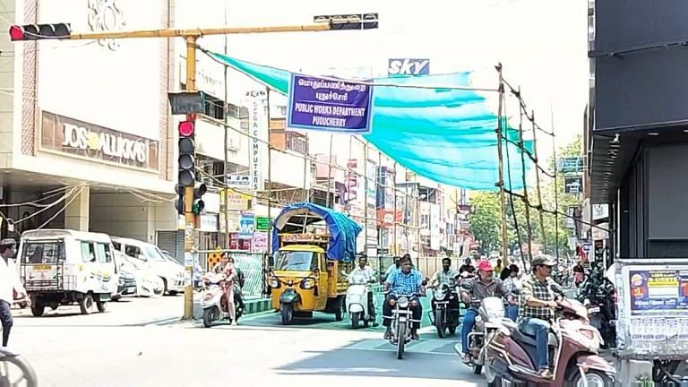 Puducherry PWD installs cloth shades at traffic signals to help commuters beat heat, Coimbatore follows