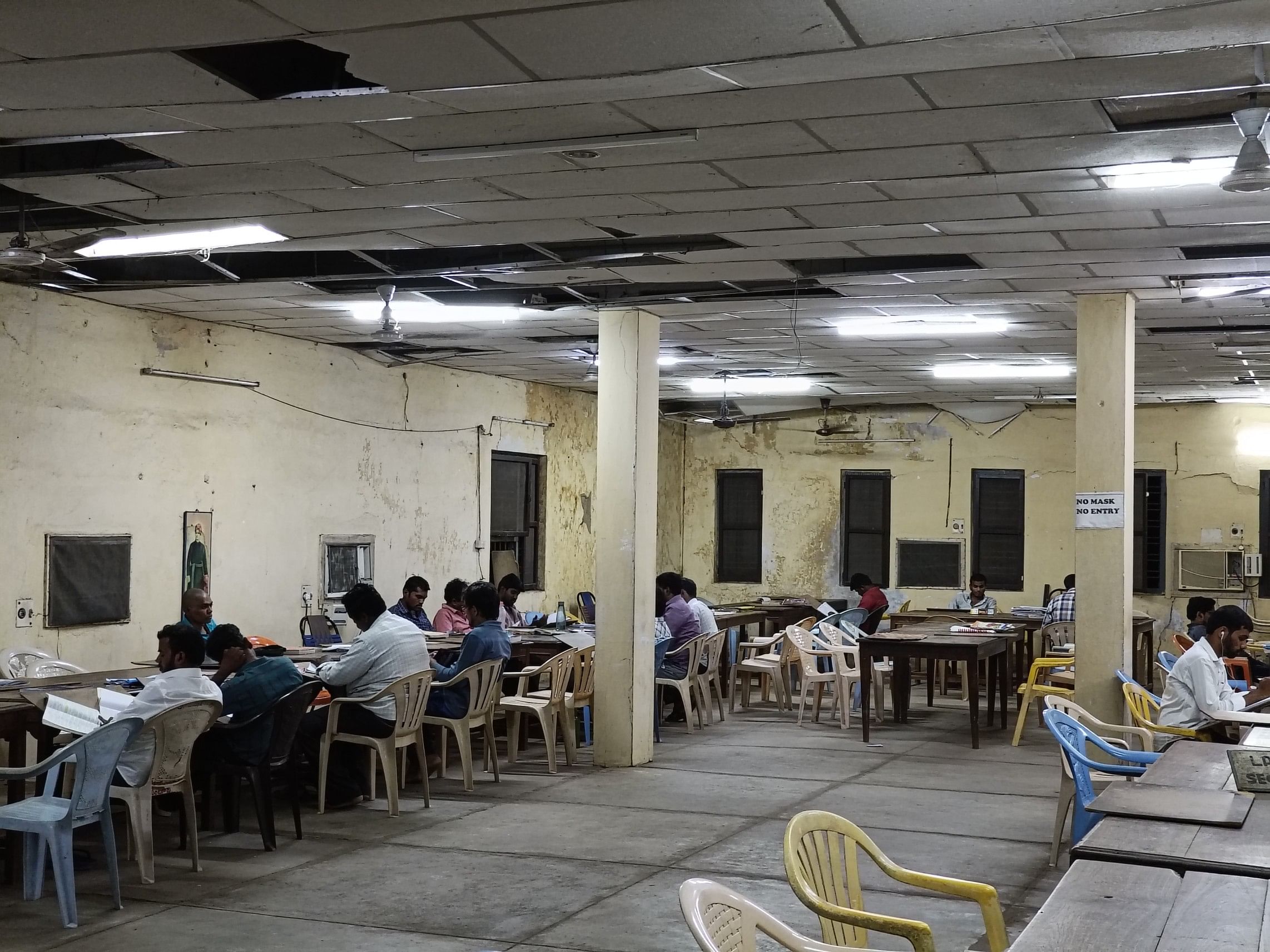 Government job aspirants hard at work in the reading room of a state library in Guntur | Prasad Nichenametla | ThePrint