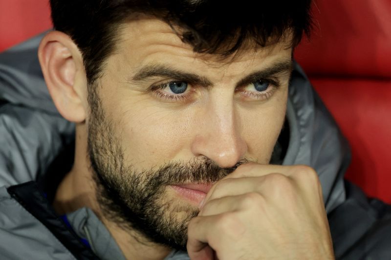 Judge puts exBarcelona player Pique under official investigation in