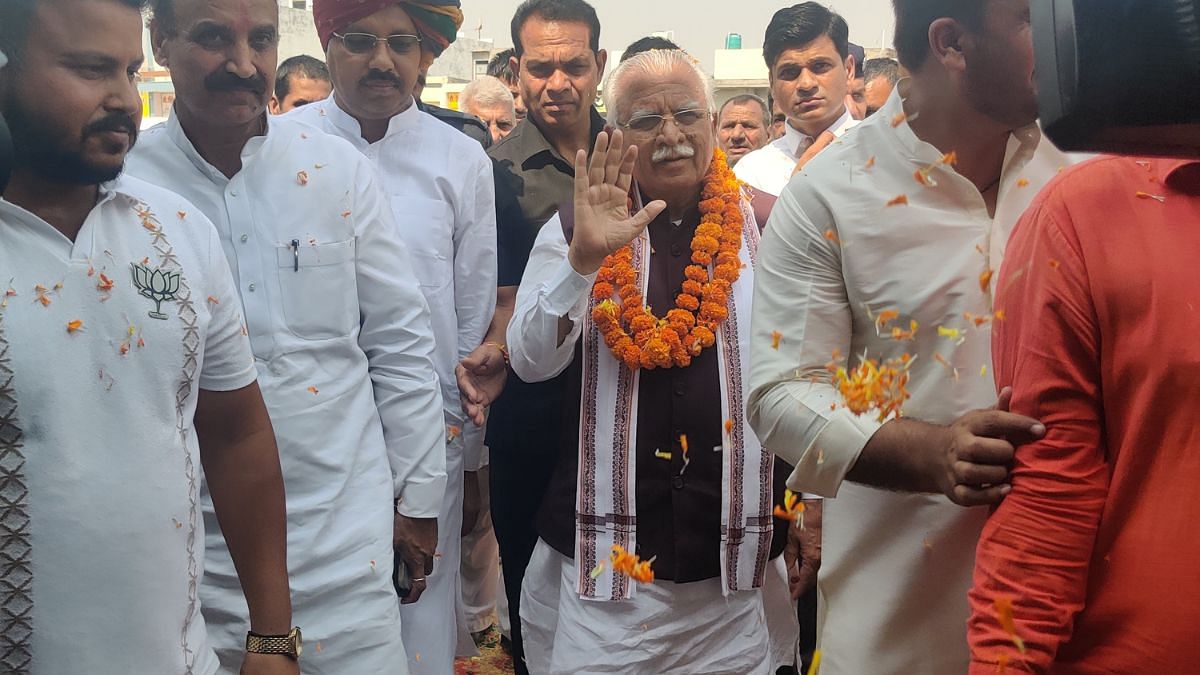 Manohar Lal Khattar greeting the crowd at the rally | Md Tanweer Hasan | ThePrint