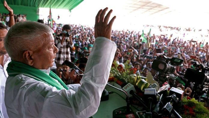 Rashtriya Janata Dal (RJD) chief Lalu Prasad Yadav addressing a public meeting in Saran | ANI