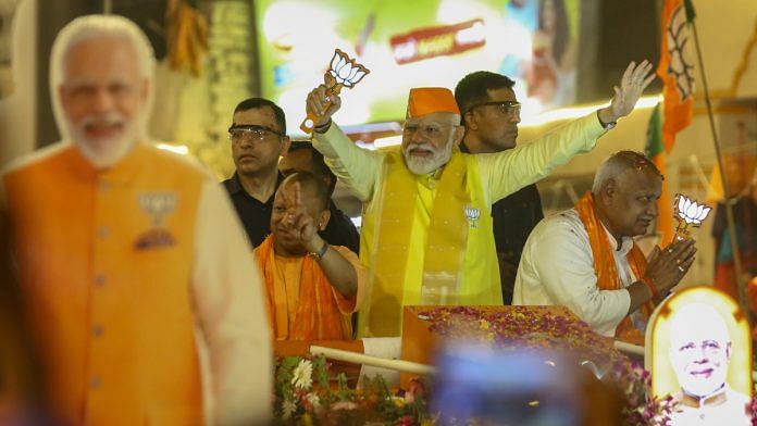 Prime Minister Narendra Modi with CM Yogi Adityanath at the roadshow in Ayodhya | Suraj Singh Bisht | ThePrint