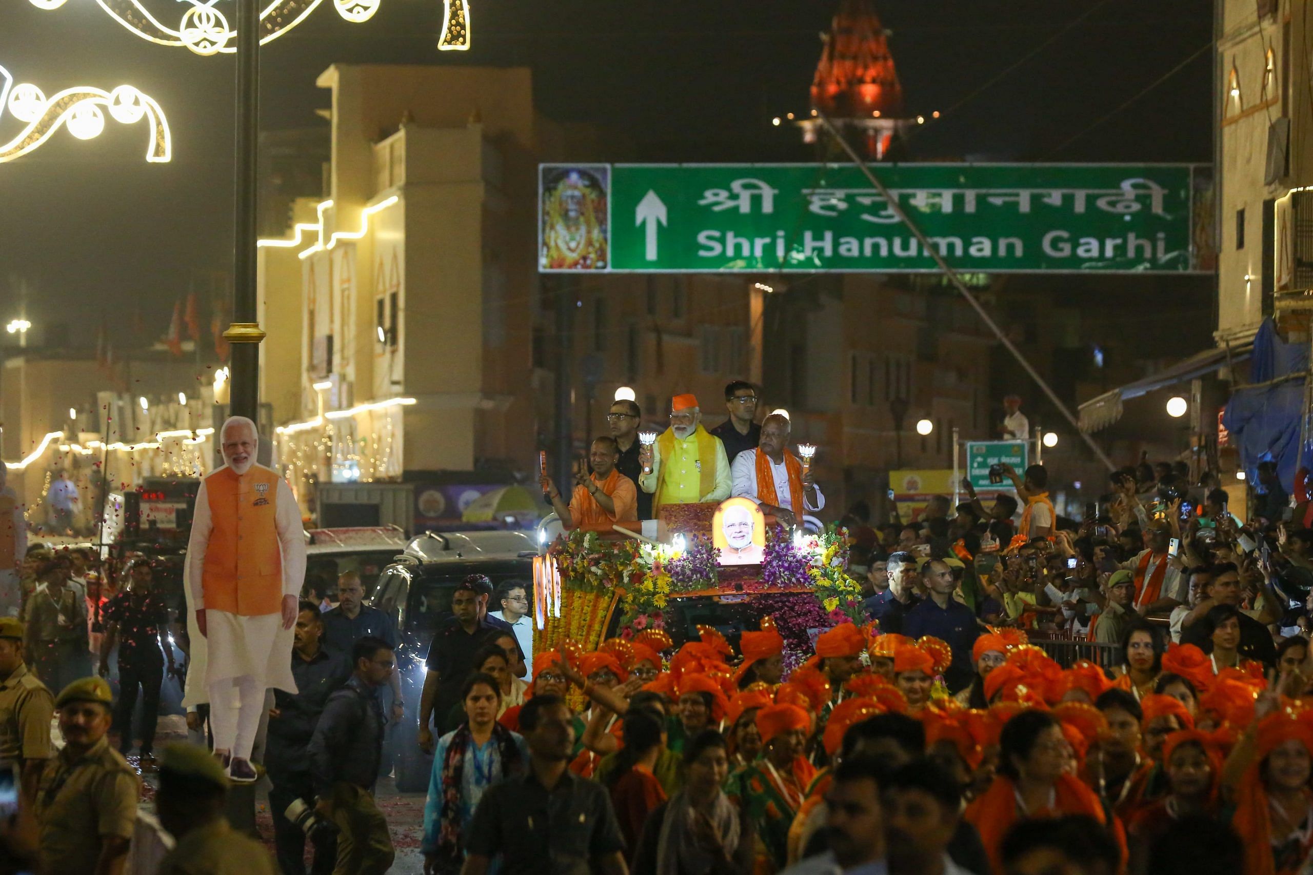 A procession of women adorned in orange turbans leads the way for Modi’s convoy | Suraj Singh Bisht | ThePrint