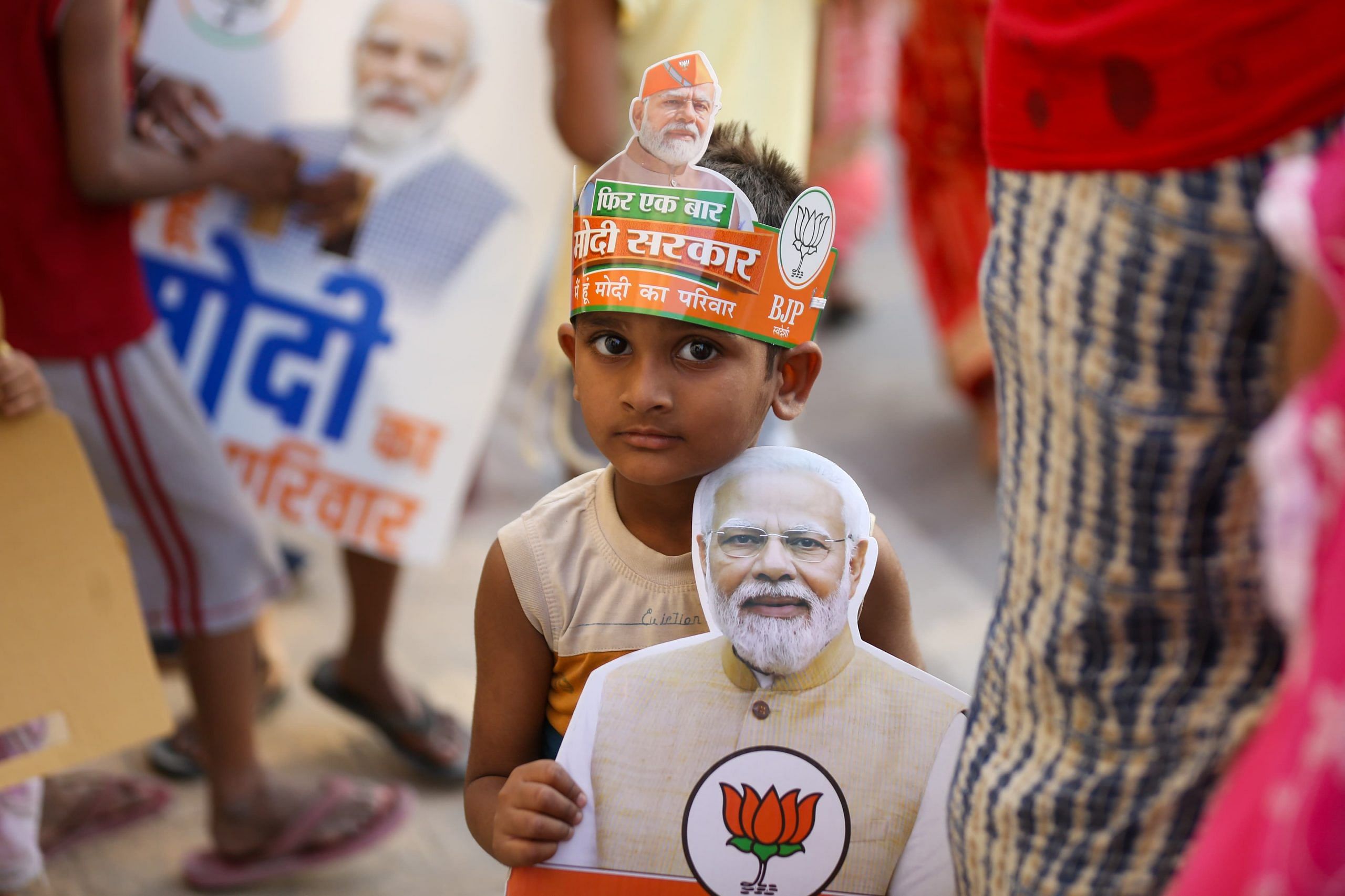 A young supporter with Modi’s poster | Suraj Singh Bisht | ThePrint