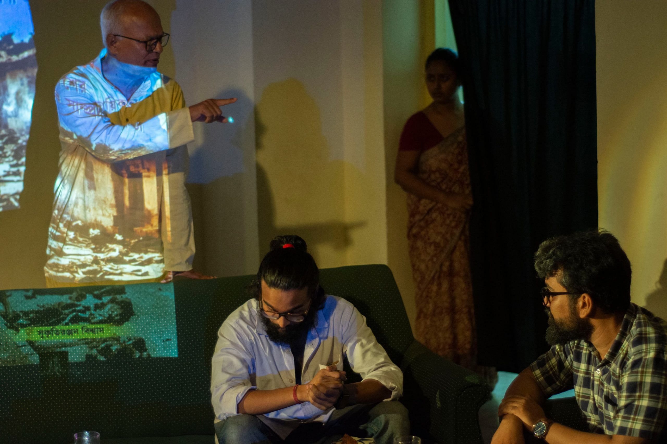 On left is activist Sukriti Ranjan Biswas as himself bringing in an element of Brechtian Alienation. Centre left Iman Kalyan Sinha Roy as Dibyendu Duttagupta, centre right , Tiyasa Chattopadhyay as Shalinee Duttagupta, Right Debasish Halder as Arpan-da | Photo by special arrangement